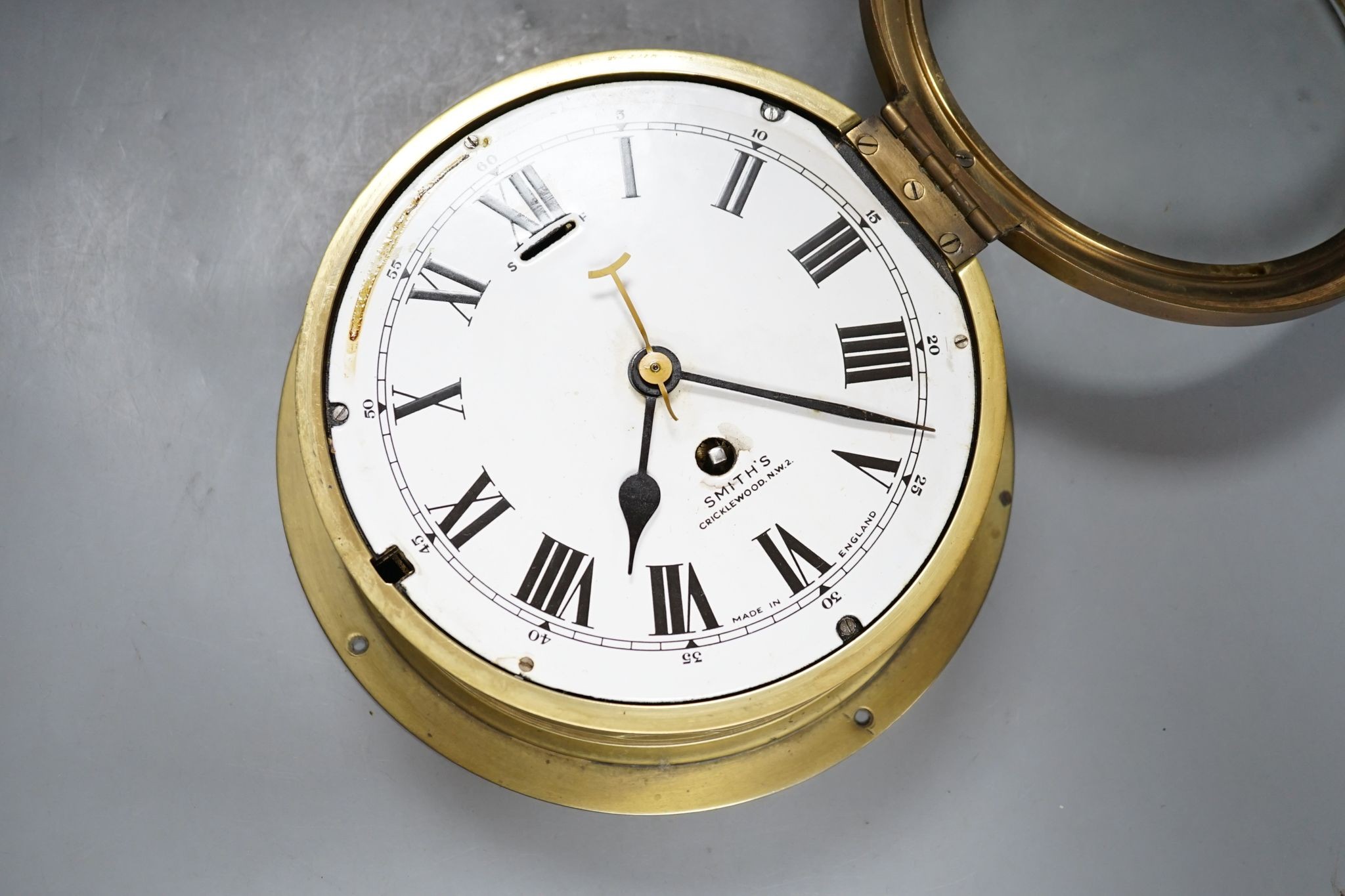 A Smith's brass bulkhead timepiece